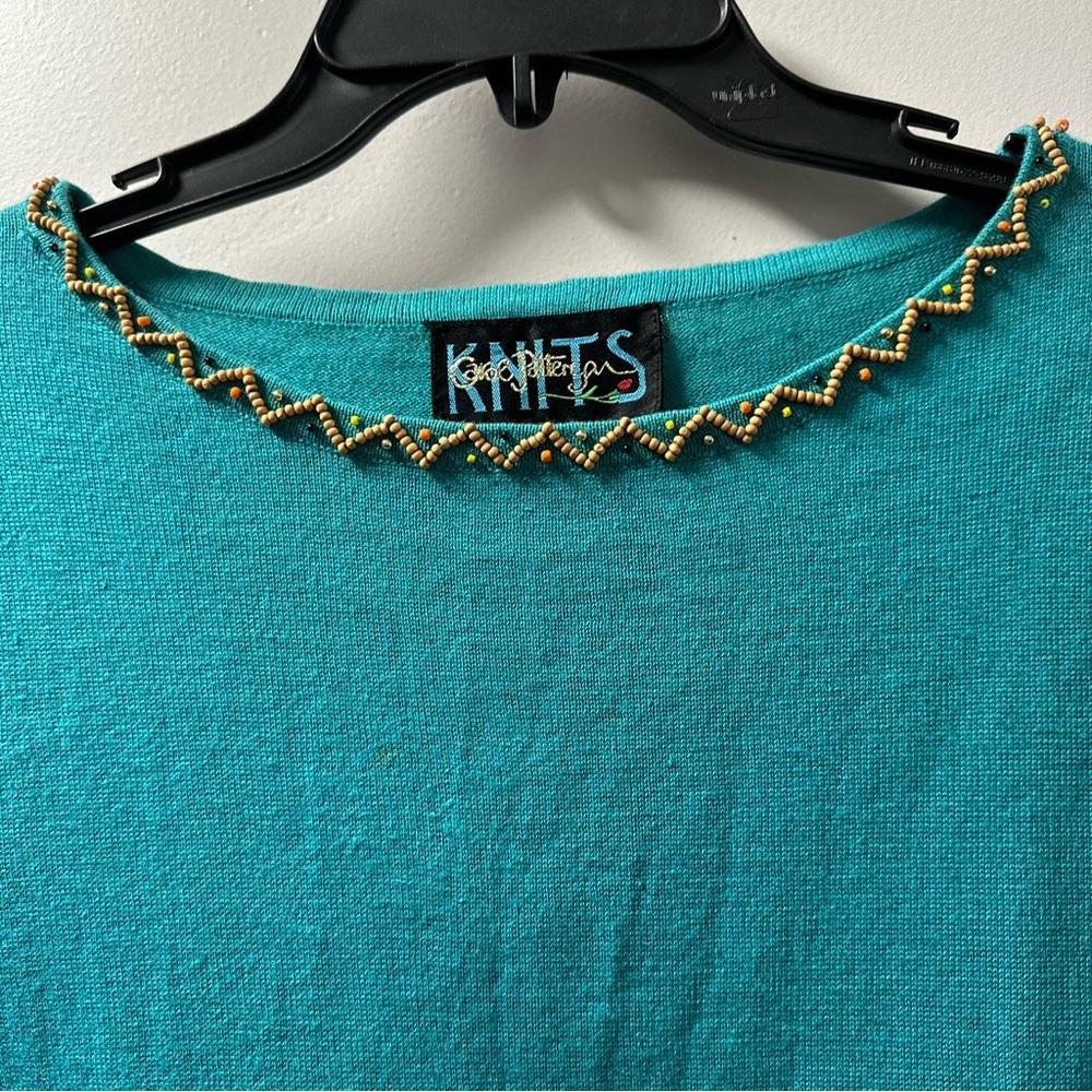 Beautiful woman top nicely decorated knits